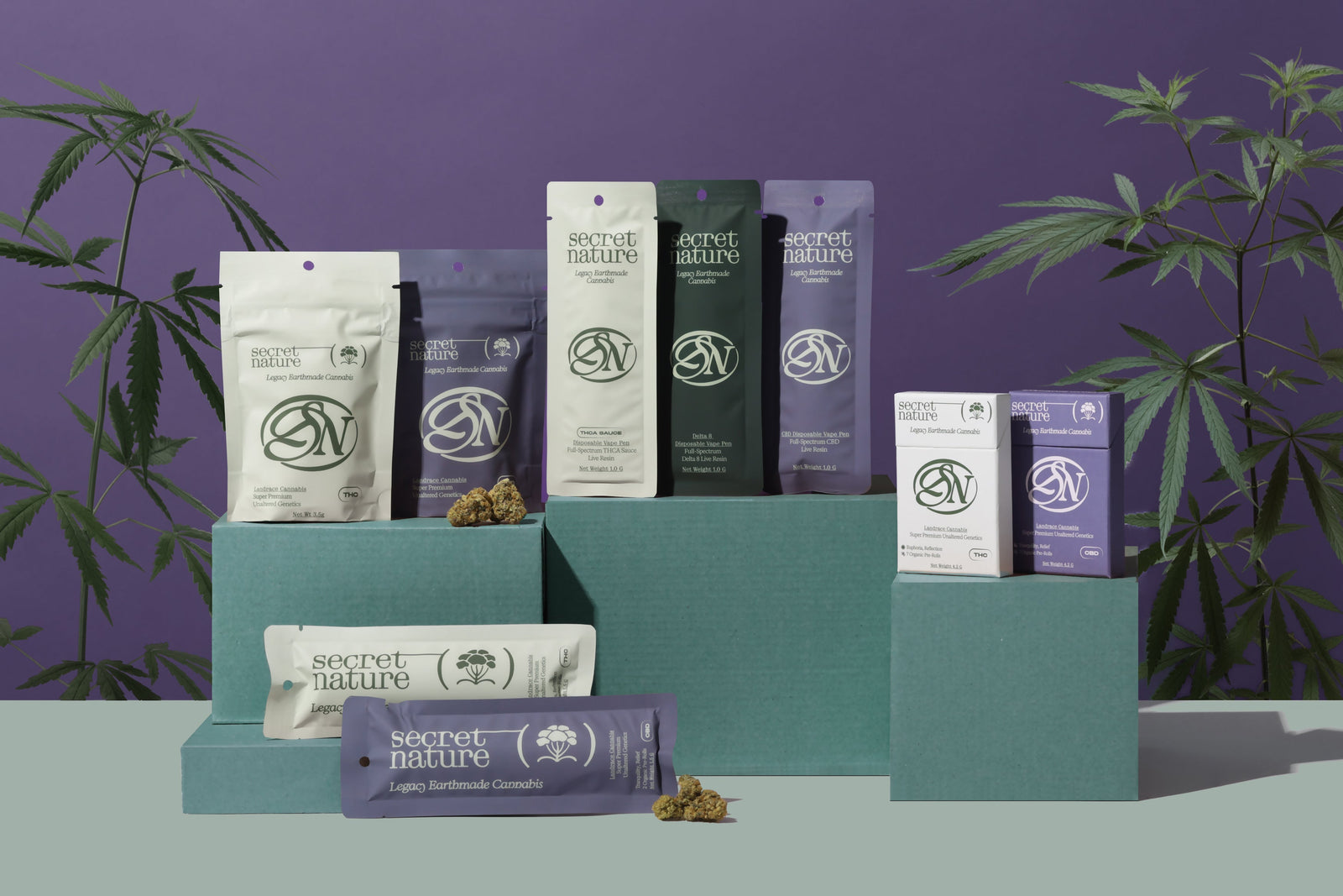 Assorted Secret Nature products including gummies, pre-rolls, vapes, and flower displayed together.