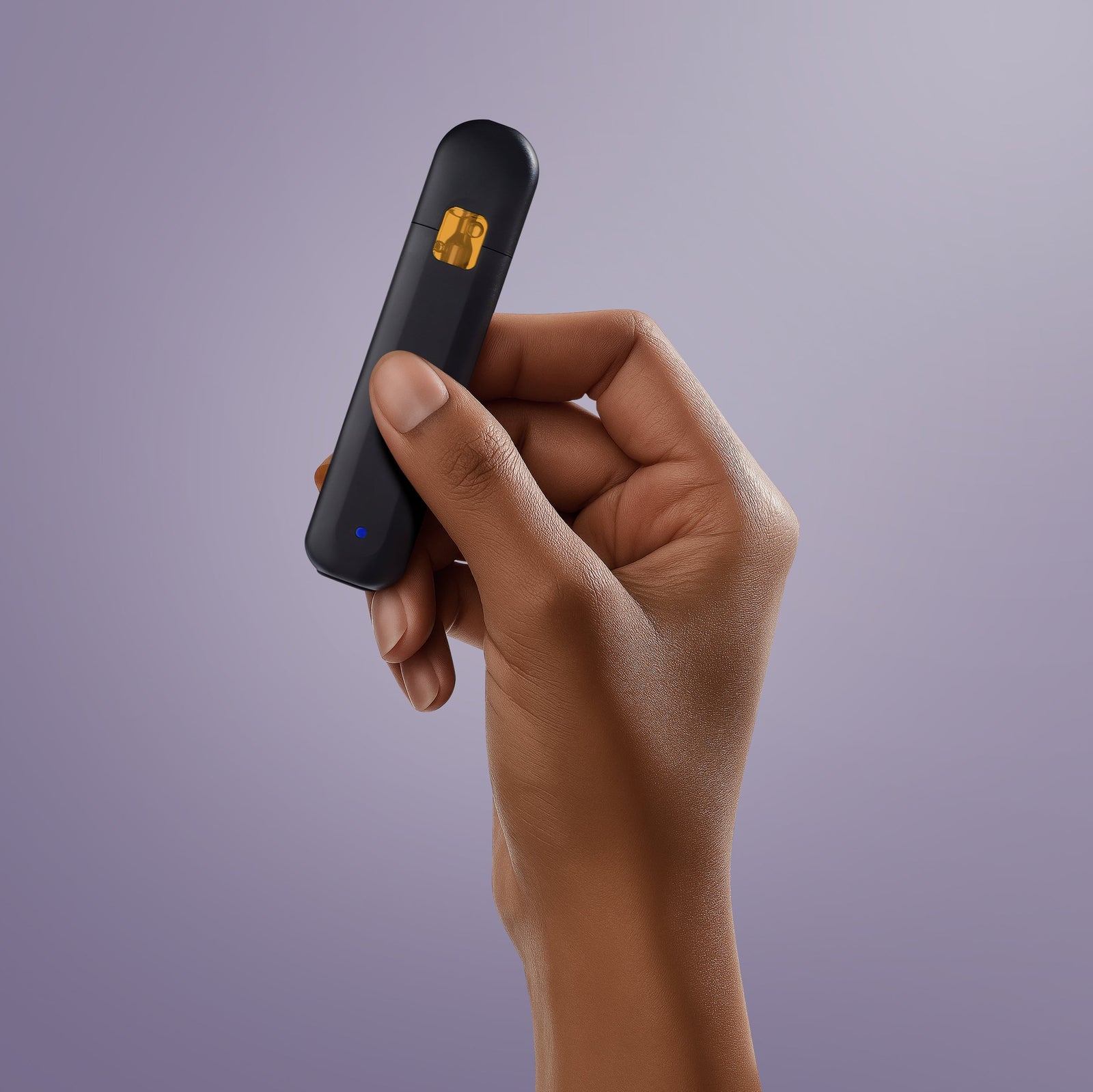 Close-up of a hand holding Secret Nature’s CBD disposable vape pen with sleek black design.